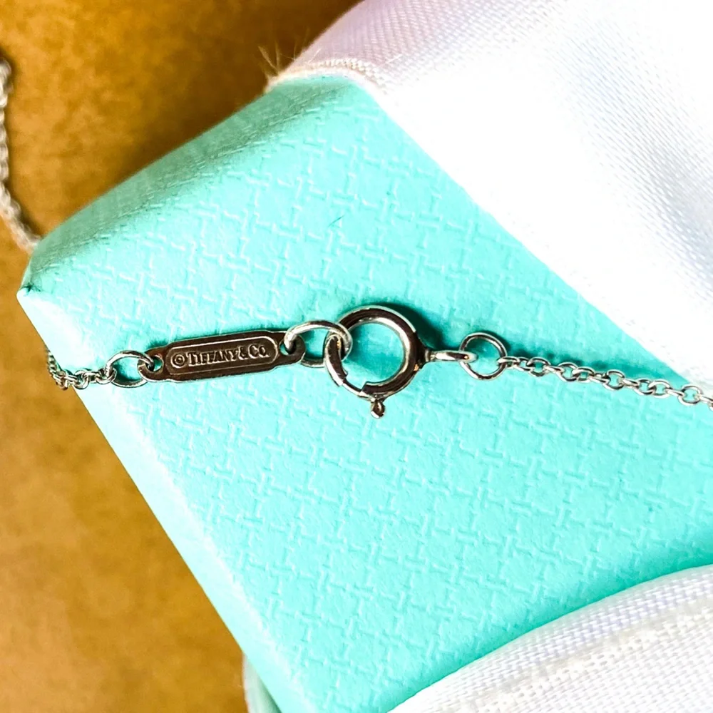Platinum and diamonds Tiffany & Co. 18” peace necklace - Picture 3 of 7